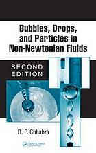 Bubbles, drops, and particles in non-Newtonian fluids