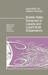 Bubble Wake Dynamics in Liquids and Liquid-Solid Suspensions